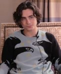 American- French Actor Timothée Chalamet Crow Blue And Black Sweater