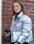 Olivia Film Our Christmas Mural 2023 Alex Paxton Beesley Silver Puffer Jacket