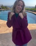 Connie Film Holiday Twist 2023 Kelly Stables Purple Belted Coat.