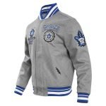Toronto Maple Leafs Pro Standard Crest Emblem Gray Varsity Jacket.