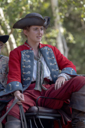 Renegade-Nell-Louisa-Harland-Red-Coat