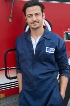 Luke Shifting Gears Movie 2024 Tyler Hynes Blue Jumpsuit