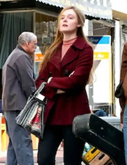 Sylvie Russo A Complete Unknown Elle Fanning Maroon Coat.