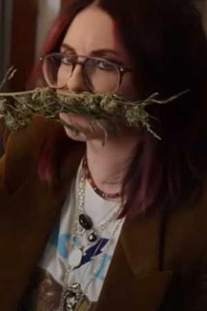 The Fabulous Four 2024 Megan Mullally Brown Blazer.