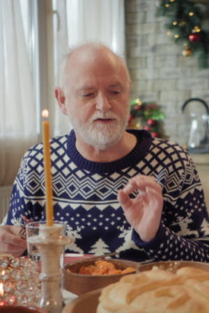 A European Christmas 2024 Paul Murphy Blue Sweater